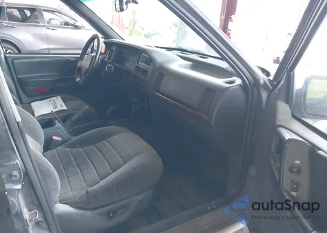 1997 Jeep Grand Cherokee Laredo/Tsi из США, поврежденный, VIN 1J4GZ58SXVC672056